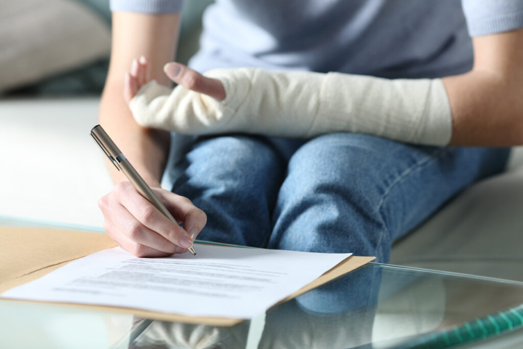 Injured Woman Filing Compensation Form